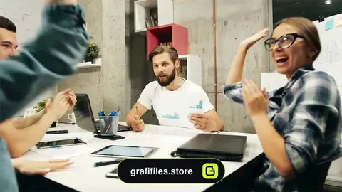فوتیج Coworkers Cheer During Meeting